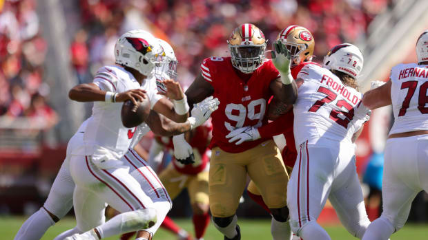Oct 1, 2023; Santa Clara, California, USA; San Francisco 49ers defensive tackle Javon Kinlaw (99) rushes Arizona Cardinals quarterback Joshua Dobbs (9) during the second quarter at Levi's Stadium. Mandatory Credit: Sergio Estrada-USA TODAY Sports